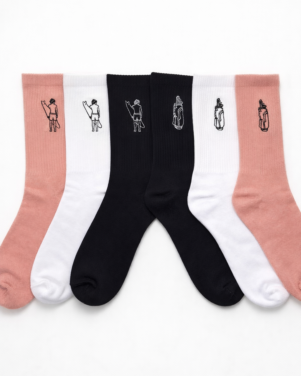 Set of Axxa socks with embroidered designs on a white background
